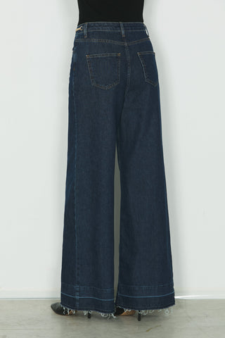 Jeans REECE vita alta 5ts con fondo sfrangiato più catena logo in blue denim