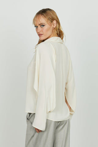 Blusa MANUSAR scollo a v manica lunga con apert. Più fusciacca