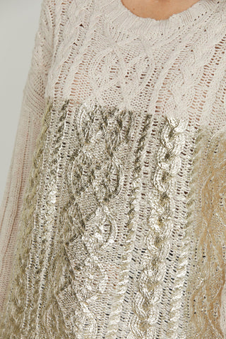 Maglia PSYLLOS manica lunga over con lavorazione trecce più spalmatura gold