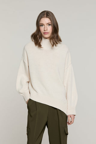Maglia LYS collo alto taglio asimmetrico
