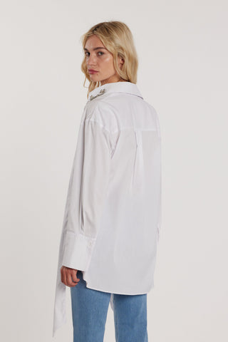 Camicia BLANCAS lunga maniche lunghe con risvolto al collo con applicazioni gioiello più fusciacca